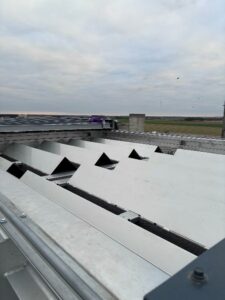 toit motorisé cheminée